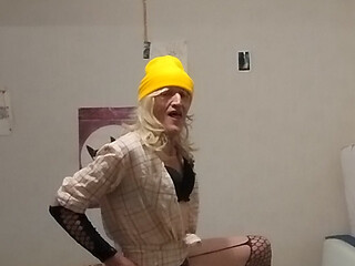 The blonde in the yellow cap shows off all excited...!! ...