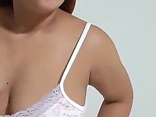 Chubby Brunette with Red Lips and Big Tits Doing What She Likes Most Receiving Cock