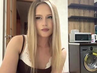 Stunning Blonde Teasing in Modern Kitchen