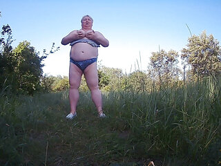 Stepmom Undressed in the Park and Pisses in Front of Everyone