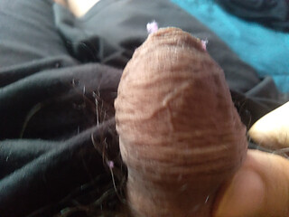 The young man likes to give affection to his enormous cock only in his bedroom