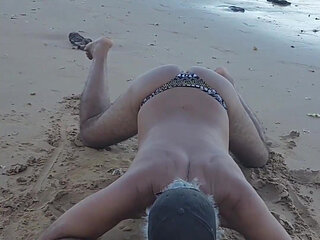 Ladysilva crossdress showing off on the beach in bikini