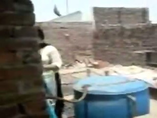Desi couple enjoys balcony sex