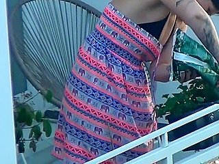 Spy BBW milf work at balcony and take off her clothes
