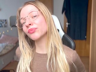 Mistress Bella Rae gives some enticing encouragement to her trans submissives