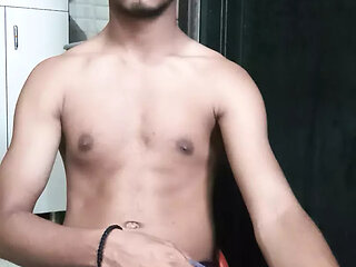 Indian young man massaging big on webcam