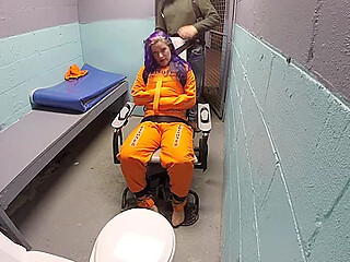 Fayth On Fire straitjacketed in a jail cell