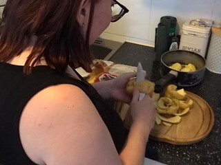 Wife cooking dinner