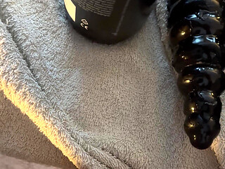 Heavy weights on my balls and a thick, huge cock in my ass.