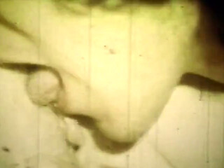 Worn Sepia Loop Captures Curly Retro Couple in Raw Bedroom Passion