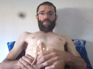 Big tits doll on her penis