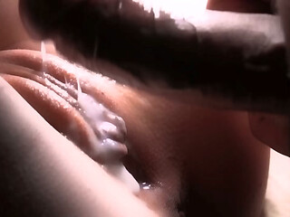Slow-motion close-up of a creamy fuck with three cumshots