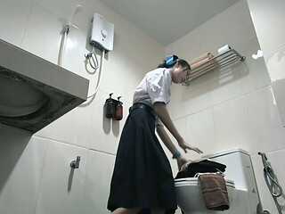 Change into a school uniform in the restroom