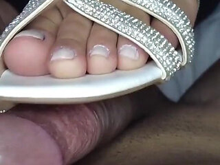 Latina Doing Oiled Footjob Wearing Shiny High Heels on Her Sexy Feet