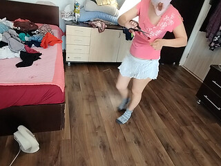 Amateur wife enjoys trying on clothes and cutting them.
