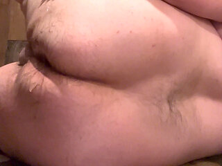 Fat boy plays with dildo