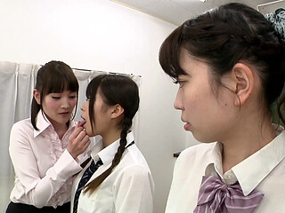 Lesbian friends get into a saliva-drenched frenzy of tongue-kissing and licking