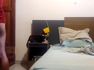 I'_m folding and putting away my clean clothes, doing it without my pants on, hoping someone catches me leaning against the bed.