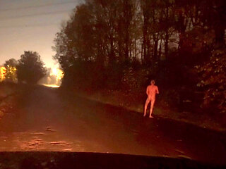 Walking away from car naked and wanking