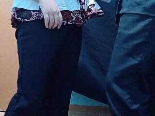 A Lonely Woman Wearing a Hijab in a Boarding