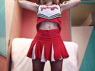 A cute, busty married woman does five exercises in a sexy cheerleader costume. Peeking down from below. Home made amateur Private Shoot