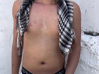 Young stud masturbates outdoor with his headscarf