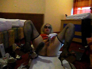 TV slave Karina fucks herself with thick dildo