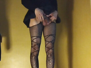 Shemale masturbating with pantyhose and high heels