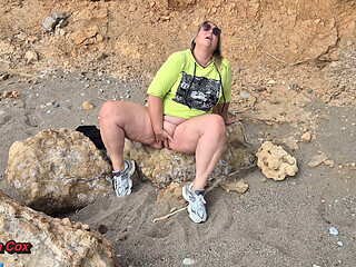 Horny Wife Masturbates on the Beach