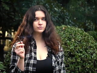 Sweet and Busty Russian Babe Smoking Cigarette in Nature