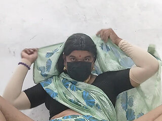 Wearing his wife's saree, bra belt, he shook his cock and took out semen