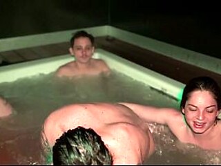 Sexy Blonde and Brunette Tease Three Stacked Men in a Wet Jacuzzi Follies