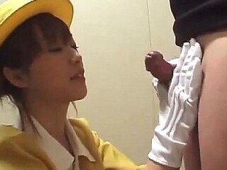 Japanese beauty gets a hot white glove handjob