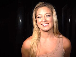 Blonde tested in a bondage room with suspension equipment