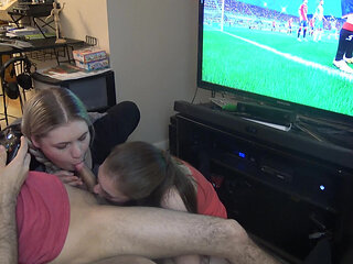 Double Blowjob While He Plays Fifa