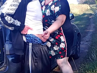 Stepmom holds my dick while I pee and then sucks it in public