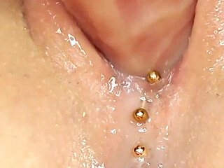 Masturbation of a Puffy Pierced Pussy, Close-up, Squirt, Pee