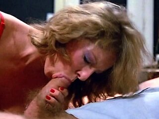 Big tit brunette MILF sucks and tit fucks a big cock