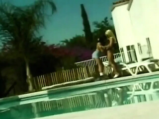 Poolside Lesbians enjoy massive tit play