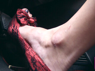 Revving, Driving and Pedal Pumping on the Way in Red Pumps