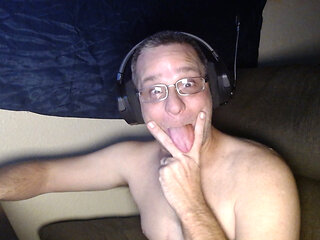 DubeSnackes sitting at his computer watching some porn on the computer. so come watch him play with his fat juicy cock.