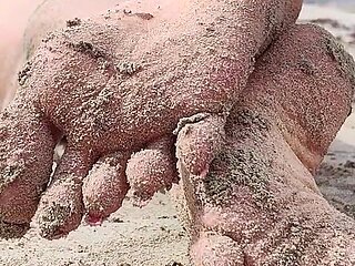 Covered in Sand and Above It All