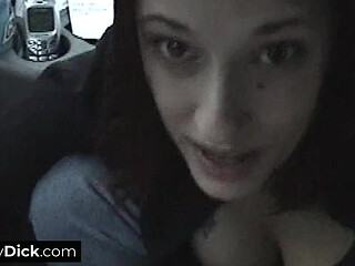 A busty brunette sucking his small dick off in the car