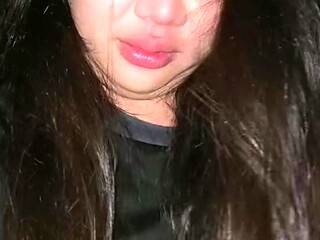 Thai girl gives a blowjob in car