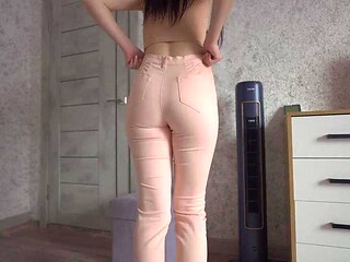 Desperate 18-year-old brunette babe pees in her jeans