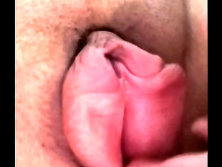 Fat whore playing with her pumped up cunt