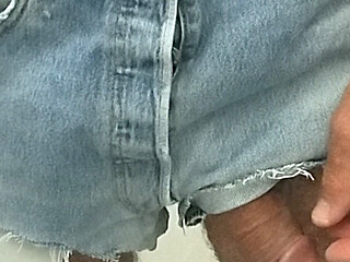 My cock comes out of my jeans