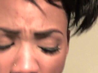 Hot ebony slut takes a white dick inside of her