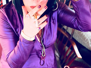 A Deliciously Glam Tina Snua Lights Up A Cigarette In A Holder With A Match - Smoking smoker Smokes