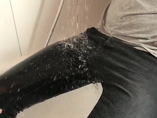 Wet black skinny ripped jeans in the shower